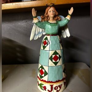 Jim Shore 2008 Pure Joy Angel 8” Figurine. She’s in lovely condition.